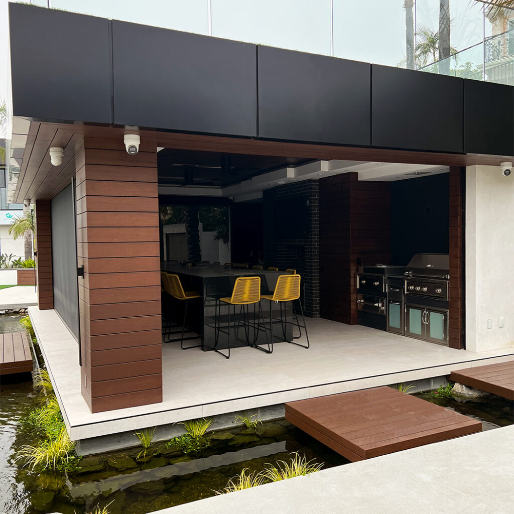 Modern building exterior showcasing Aluminum Composite Panels (ACP), with sleek black panels enhancing the facade for a durable, weather-resistant, and aesthetically appealing look.