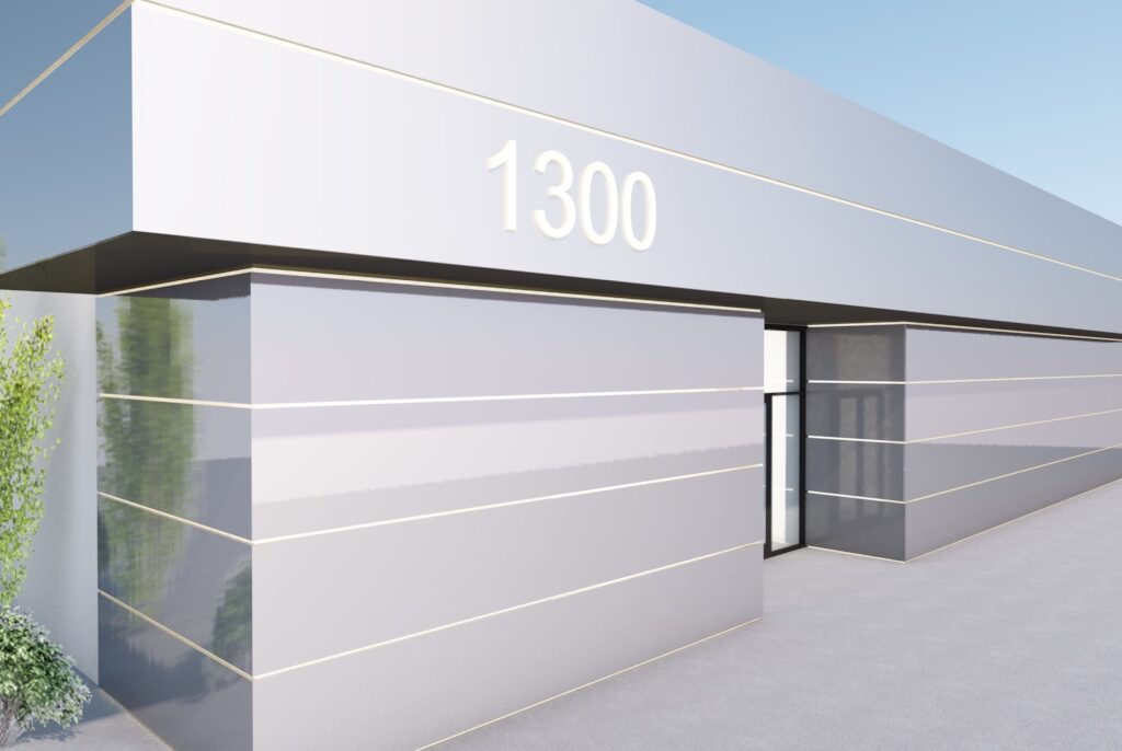 3D commercial facade visualization with light gray ACP cladding and projecting entrance canopy