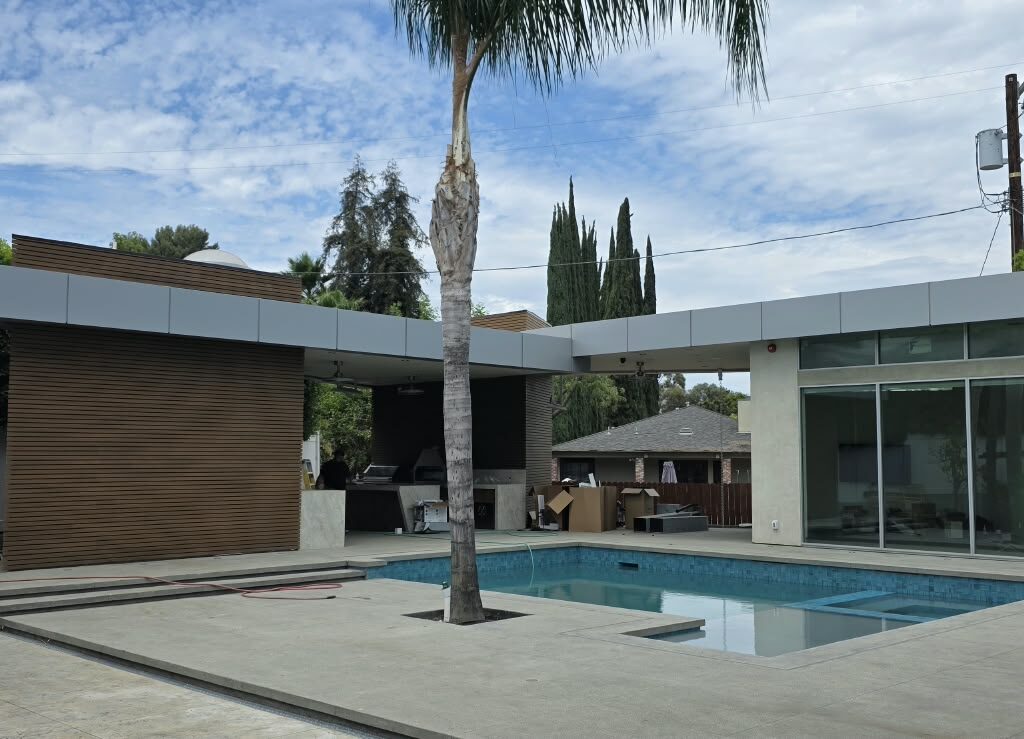 ACP canopy with aluminum composite panels around a modern pool house in Los Angeles