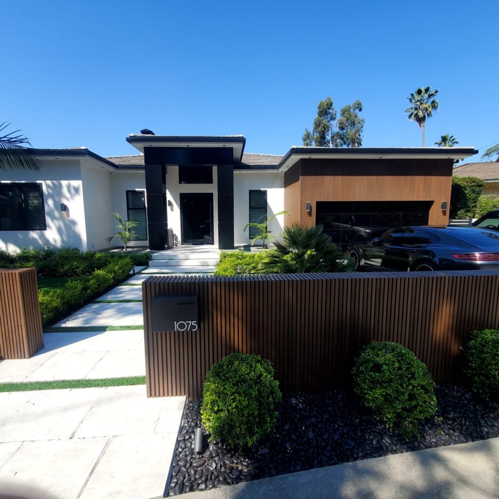 Black ACP column cladding on modern residential entrance in Los Angeles