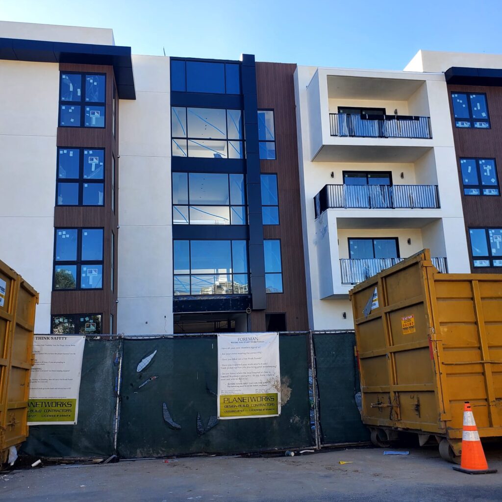 Commercial ACM facade installation on multi-story building