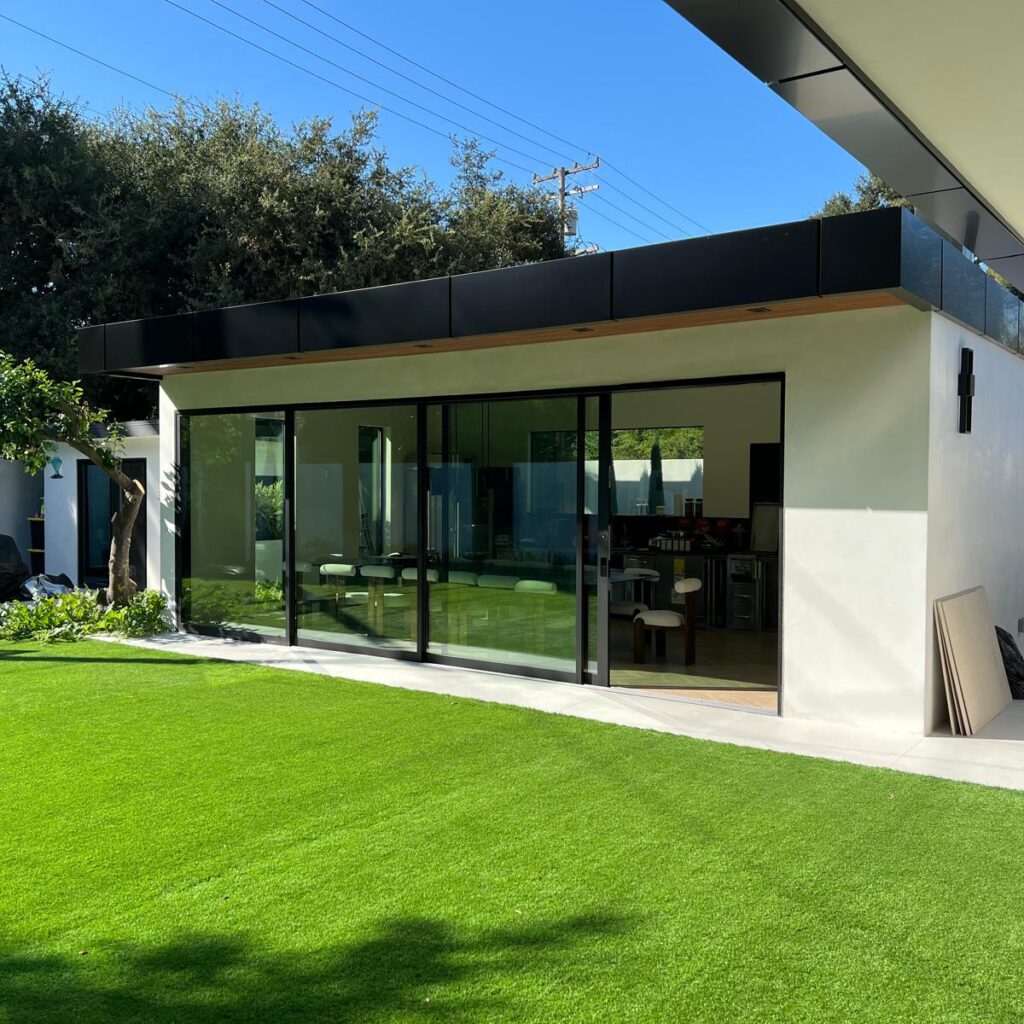 Modern ACP canopy with black aluminum composite panels on a guest house in Los Angeles